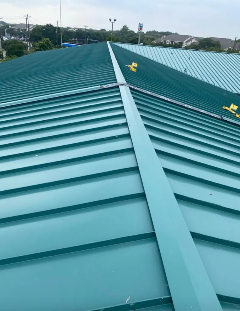 Green commercial metal roof ridge and valley for Metal Roof Repair in Lackland AFB