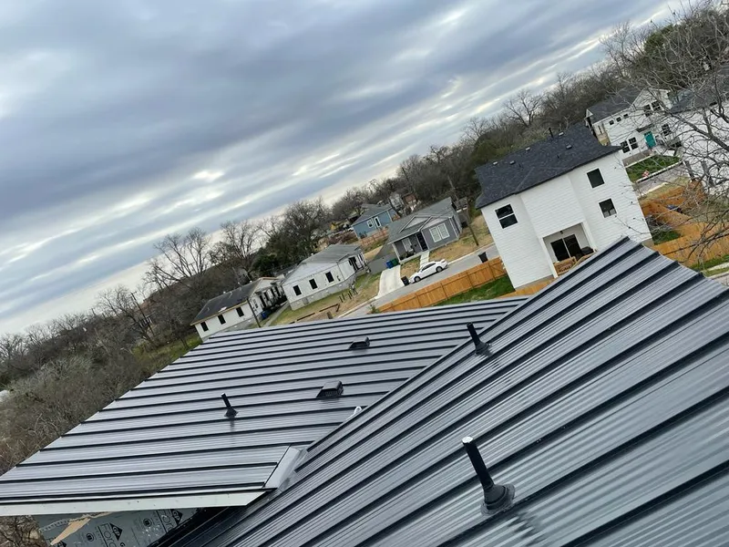 Standing seam metal roof panels with vents for Skylight Repair in Lackland AFB